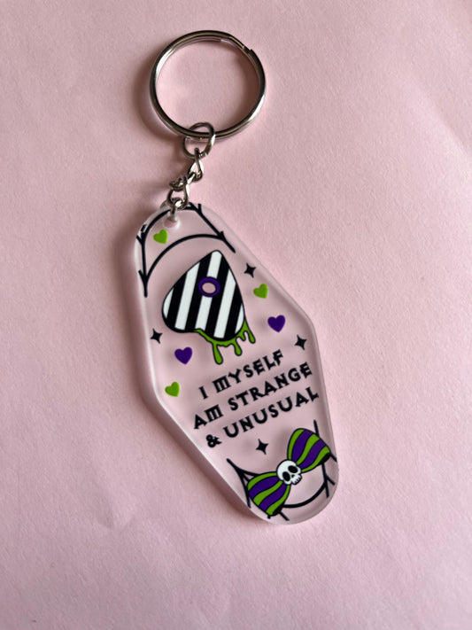 Strange & Unusual Clear Keyring